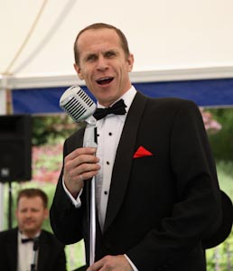 Photograph of Paul Holgate of So Sinatra singing at Chelsea Flower Show 2007 taken by John James of jj99 associated with Photo 3 Solutions Ltd